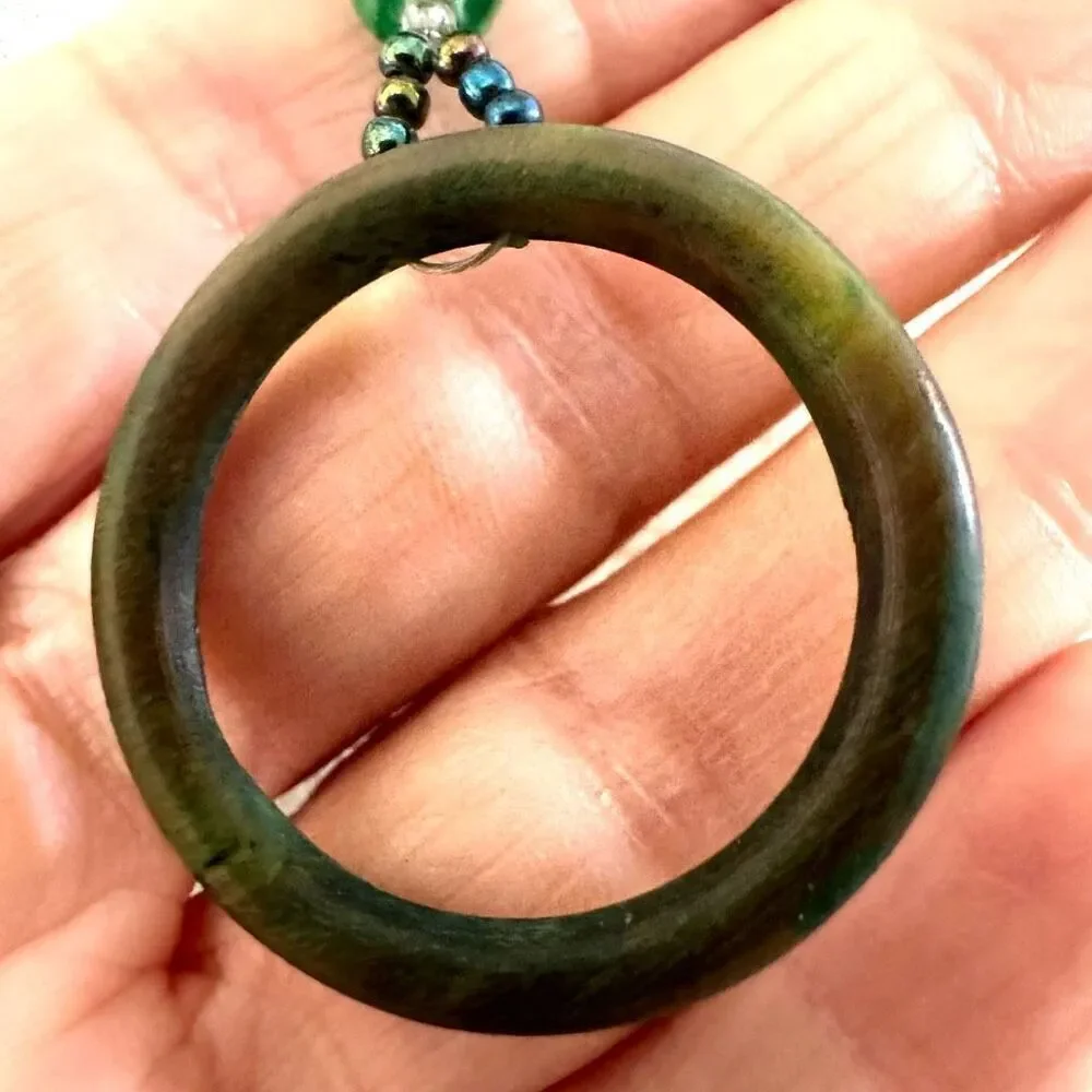 Green open circle beaded pendant necklace